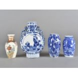 A Chinese porcelain moon flask, decorated in blue and white with a gentleman and his dog and