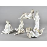 Four Nao ballerina figures, and one other Spanish figure of a girl and puppy (5)