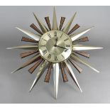 A Metamec starburst wall mirror, 61.5 cm diameter max