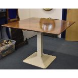 An Art Deco style cast iron and quarter veneered table by B & B Italia circa 1960,