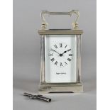 A Mappin and Webb silver plated carriage timepiece, white face and roman numerals, 13 cm high