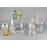 A soda glass bubble included vase, with grape and vine decoration, a wheel engraved jug, an