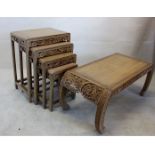 A set of four Chinese hardwood nest of tables, together with a marching coffee table (5)