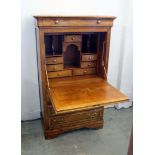 A Continental cherry wood upright desk by Selva of Italy, the front folding down to reveal