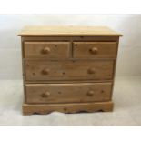 A pine chest of drawers, two short over three long 86 cm wide x 42 cm deep x 76 cm high