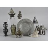 A small collection of Asian metalware, including a brass and turquoise decorated jar and cover, a