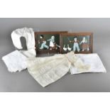 A collection of Christening gowns, children's clothes, pillow cases etc from the mid to late 19th