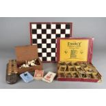 A 19th Century carved bone chess set, Staunton style, 32 pieces in natural and stained red