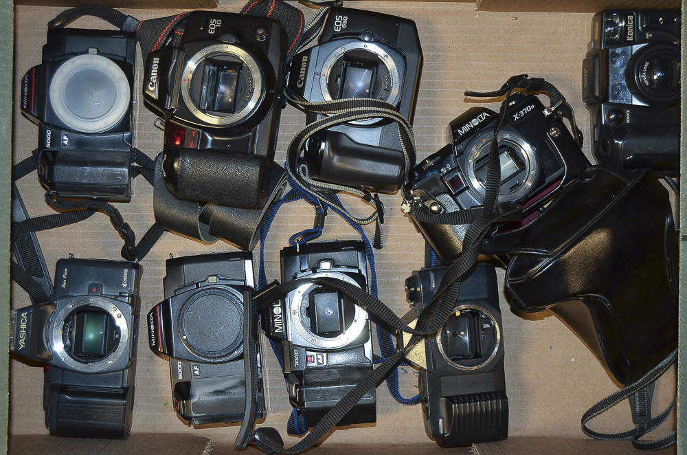 A Tray of 35mm SLR Camera Bodies, manufacturers include Canon, Minolta and Yashica.