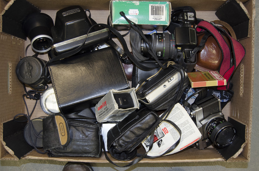 A Tray of 35mm Cameras and Accessories, including a Pentax SF7, a Praktica MTL3, a Yashica