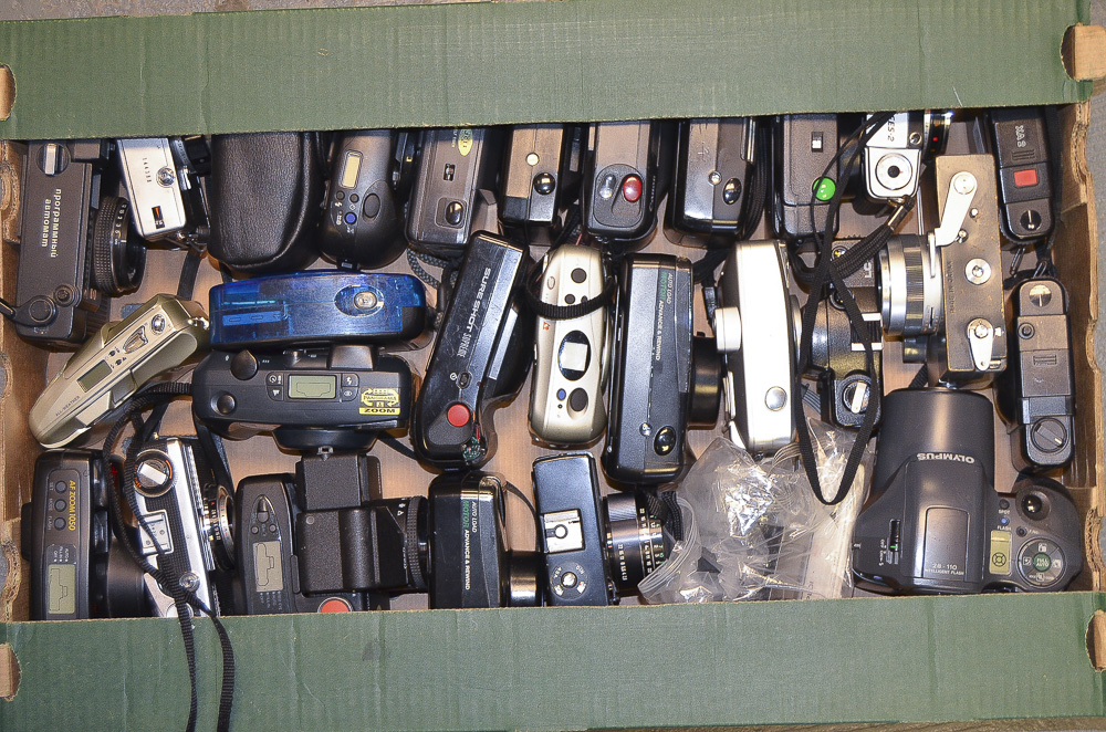A Tray of Compact Cameras, manufacturers include Olympus, Canon, Yashica other examples and a box of