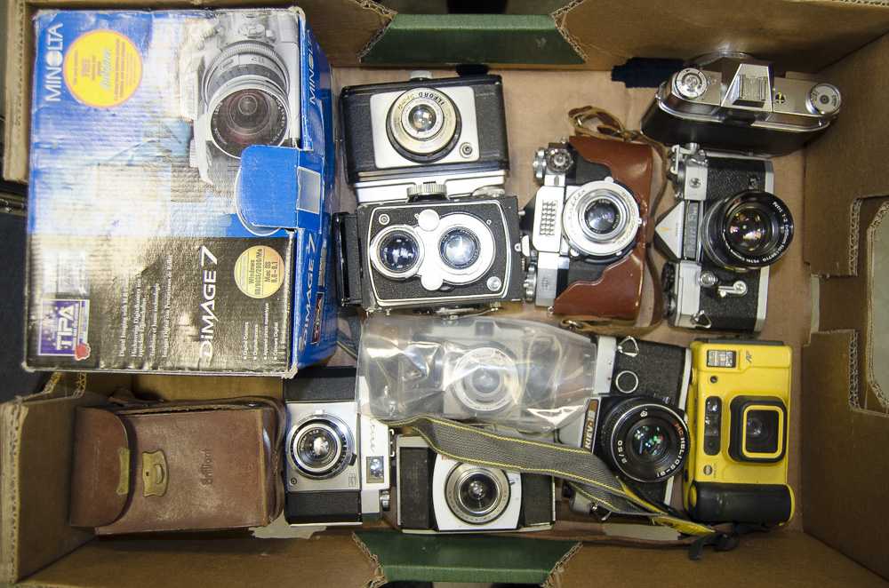 A Tray of Various Cameras, including a Zeiss Ikon Contaflex Super and Contina, a Kodak Retina Reflex