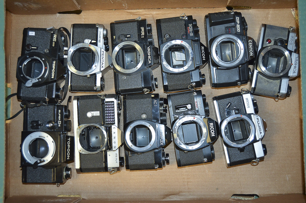 A Tray of 35mm Camera Bodies, manufactures include Ricoh, Yashica, Pentax and other examples.