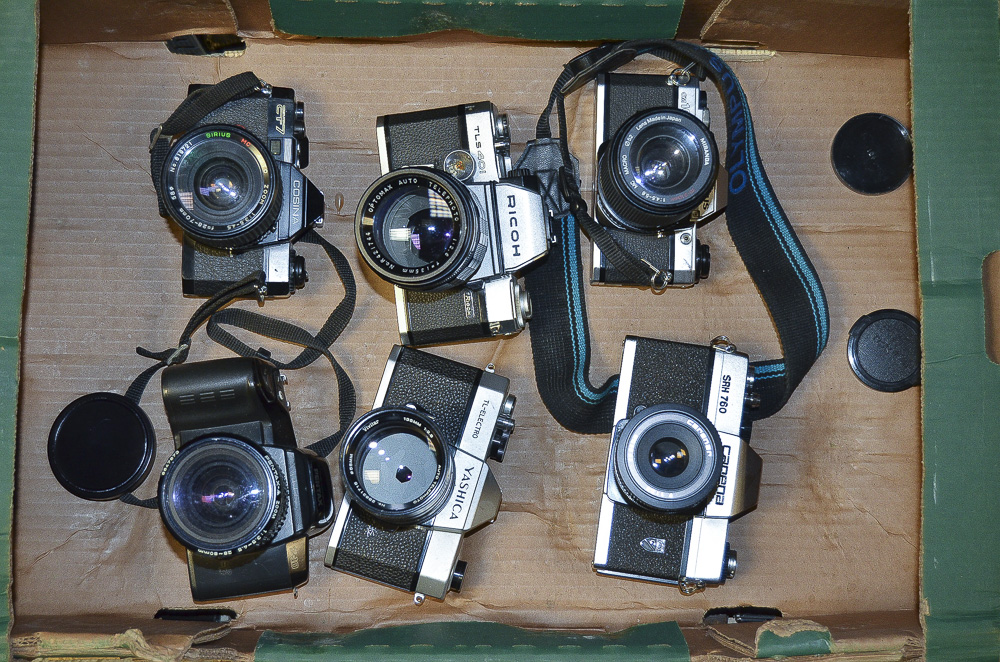 A Tray of SLR Cameras, including a Olympus OM10 with a 70-210 Miranda lens, a Ricoh TLS 401 with a