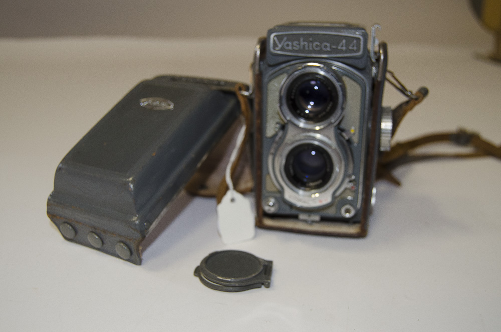 A Yashica-44 TLR Camera, with 60mm f/3.5 lens, body G, elements G, shutter working in original