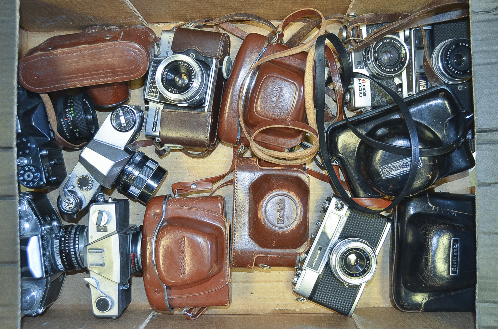 A Tray of 35mm Cameras, including SLR cameras Paktica, Zenit, Exakta, Fed, Yashica, rangefinders