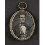 Daguerreotype Oval Lockets, gold-coloured metal, ninth-plate - young man, smartly dressed, with