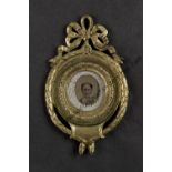 Photographic Jewellery, gold-coloured metal - ninth-plate oval Daguerreotype locket of seated man,