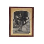 An Ambrotype Family Portrait Group, quarter-plate, father seated in doorway, with daughter, son
