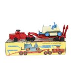 A Raphael Lipkin Mighty Antar Transporter With Bulldozer, red plastic Mighty Antar Transporter