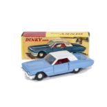 A Hong Kong Dinky Toys 57/005 Ford Thunderbird, blue body, red interior, white roof, spun hubs, in