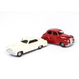 Lincoln Toys (New Zealand) Austin A40, red body, silver trim, diecast hubs, friction motor, black