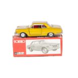 A Buby (Argentina) No.1022 Torino Coupe, gold body, red interior, silver hubs, in original box, VG-