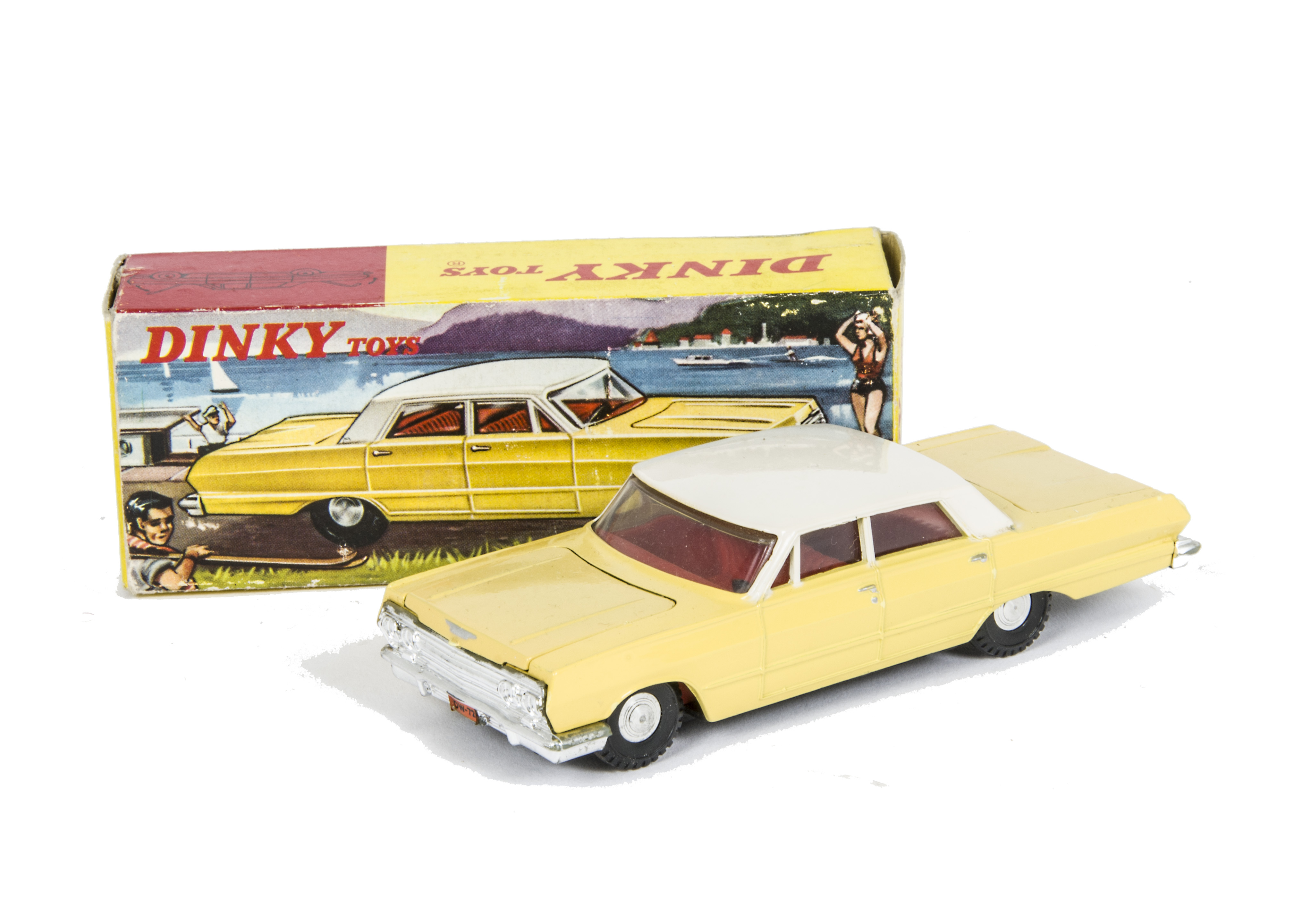 A Hong Kong Dinky Toys 57/003 Chevrolet Impala, pale yellow body, white roof, red interior, spun