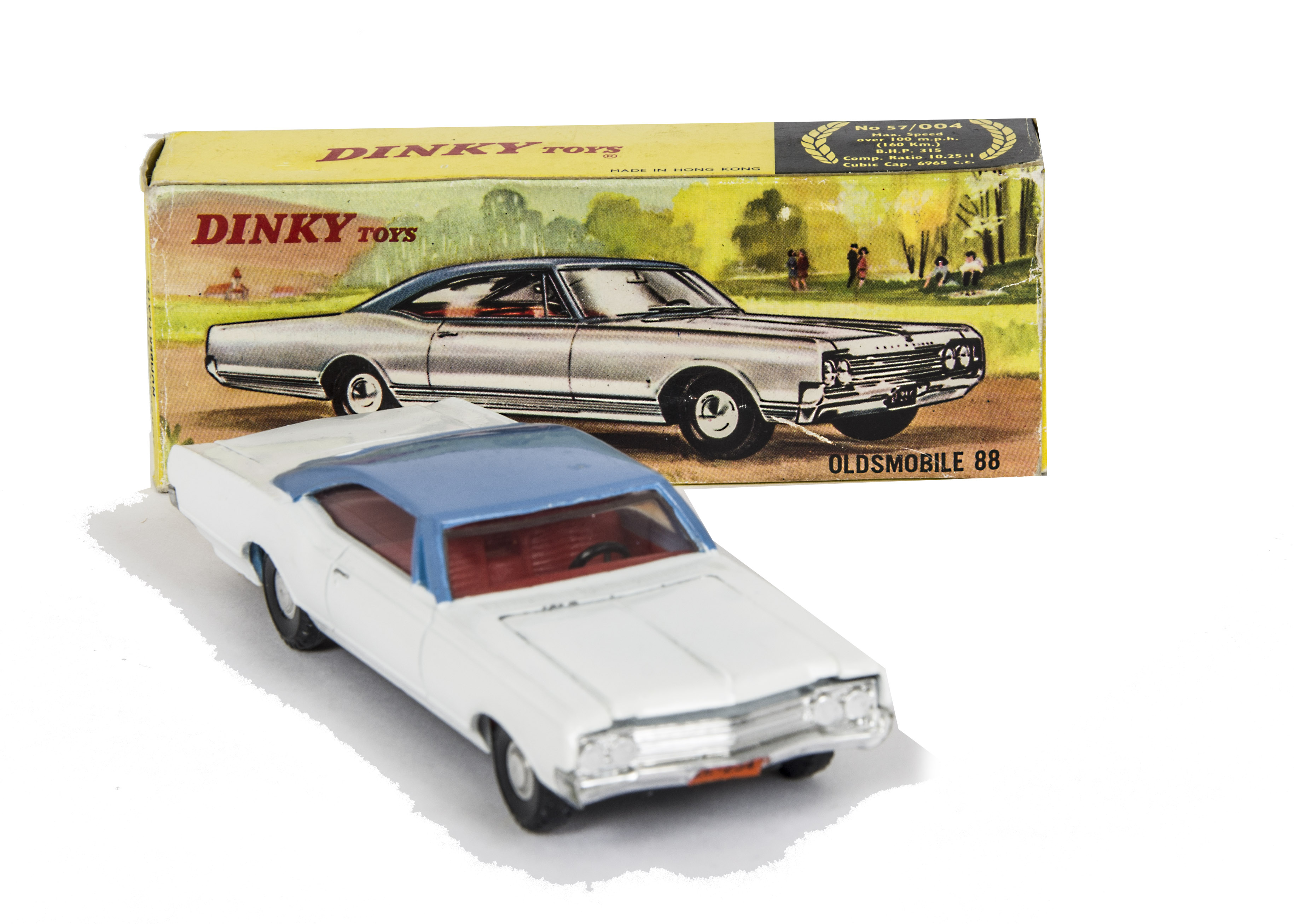 A Hong Kong Dinky Toys 57/004 Oldsmobile 88, white body, red interior, blue roof, spun hubs, in