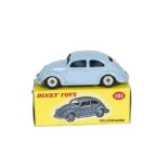 A Dinky Toys 181 Volkswagen, light blue body, matt black base, spun hubs, in original lighter yellow