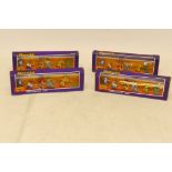 Boxed Herald Cowboy Sets, Four sets each containing five plastic cowboy figures and a cactus, (