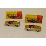 Dinky Toys, Two boxed Dinky Toys 114 Triumph Spitfires, both in gold livery, one with black base