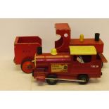 Large Toy Floor Trains, A Triang steel pull along Puff-Puff locomotive in red livery, with