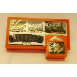 A Mamod O Gauge Live Steam Freight Train Set and Brake Van, the set with green SL1 locomotive, two