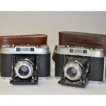 Two Agfa Super Isolette Folding Cameras, both with Solinar 75mm f/3.5 lenses, G-F