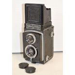 A Rolleicord Ia TLR Camera, with a Zeiss Triostar 7.5cm f/4.5 lens, shutter working, body G,