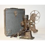 A Bell & Howell Filmo 8 Projector, model 122-B, in original case