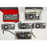 Olympus XA 35MM Compact Cameras, including XA 2 (4) XA 3 and a Voiglander Vito C.