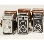 Three TLR Cameras, a Zeiss Ikon Ikoflex with a Novar-Anastigmat 75mm f/3.5 lens, a Firstflex with