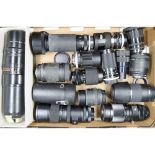 A Tray of Zoom Lenses, including a Canon ET 60 75-300mm, Sigma Zoom 75-300mm, a boxed Telemegor 5.