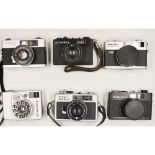 35mm Compact Cameras, including a Rollei XF 35, a Voigtlander VF 135, a Ricoh 500 G, a Minolta Hi-