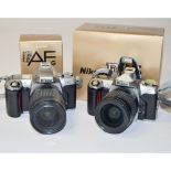 Two Nikon F 65 35mm Cameras, a 28-80mm f/3.5-5.6D Nikkor lens, 28-80mm f/3.3-5.6G Nikkor lens and