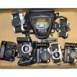 A Tray of 35mm SLR Cameras, including Pentax ME-Super (3) a Pentax MX, an Olympus OM-1, a PetrinFT-