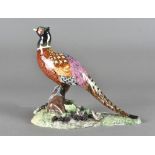 A Royal Crown Derby model of a pheasant, painted in coloured, printed factory mark to base, 17 cm