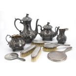 An Art Deco silver five piece dressing table set, together with a Victorian four piece pewter tea