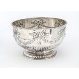 A large vintage silver plated punch bowl, with bows and swags above fluted lower, 32 cm diameter