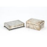 Two mid 20th Century silver cigarette boxes, both with engine turning, one short on bracket supports