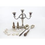 A collection of silver and silver plate, including a pair of silver cruets, a silver serving spoon