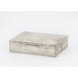 A late 1960s silver cigarette box by SJR, rectangular with textured lid, 14 cm wide, London 1969