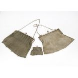 Three early 20th Century silver plated evening purses, two larger examples with chain straps, and